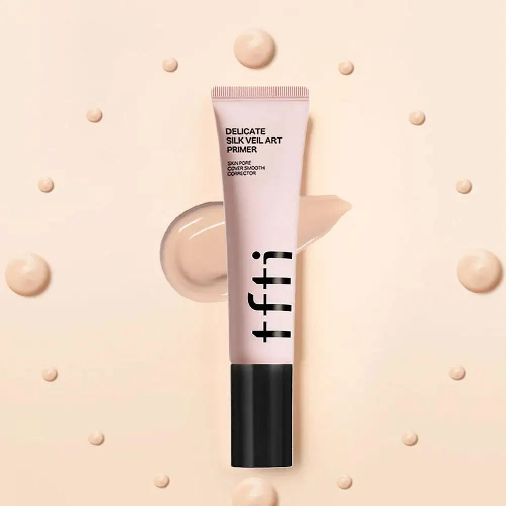 TFIT facial makeup kit featuring Delicate Silk Veil Art Primer tube on a soft background with cream swatch.