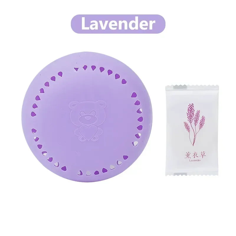 home fragrance solid air freshener in lavender scent, round purple design with bear shape and heart cutouts.