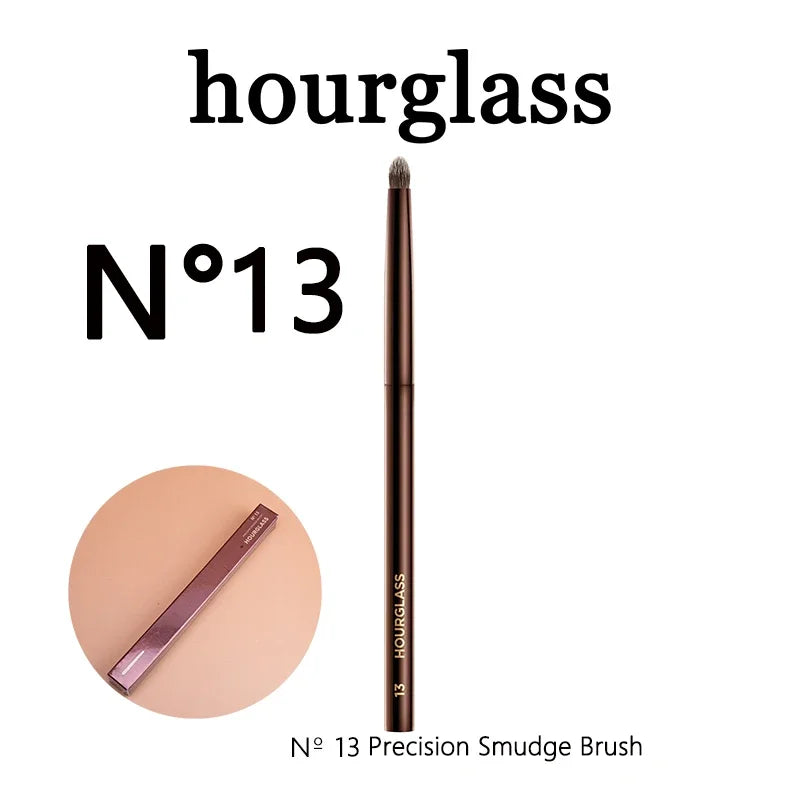 Hourglass N° 13 Precision Smudge Brush with metal handle and synthetic bristles for precise makeup application.