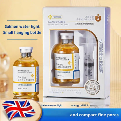 Skin Rejuvenation Essence Korean Salmon Serum in a small hanging bottle with energizing cell fluid.